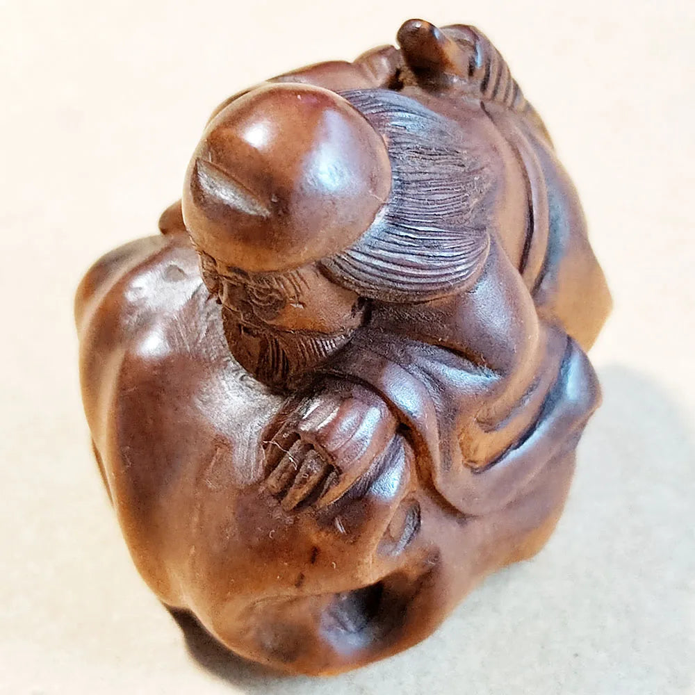 statue bois sculpture marron traditionnelle figure assise détails fins artisanale japonaise élégante objets mains