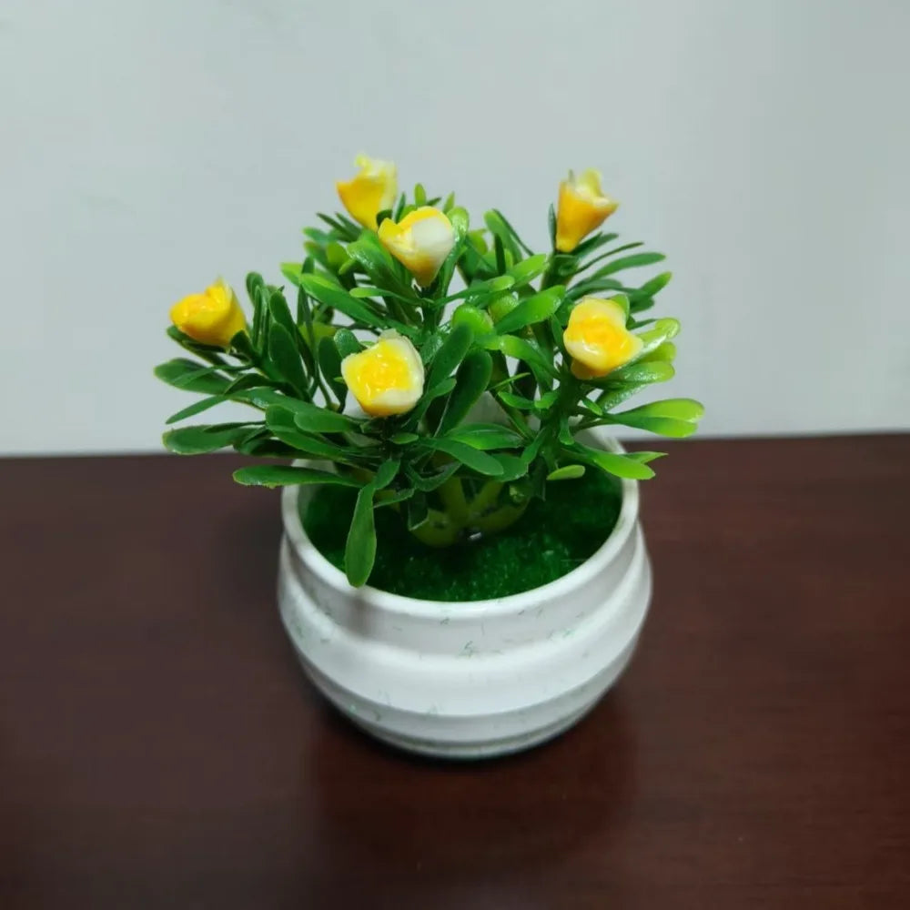 plantes artificielles moderne pot blanc fleurs couleur vert rose jauneintérieur decoration feuilles verte differentes