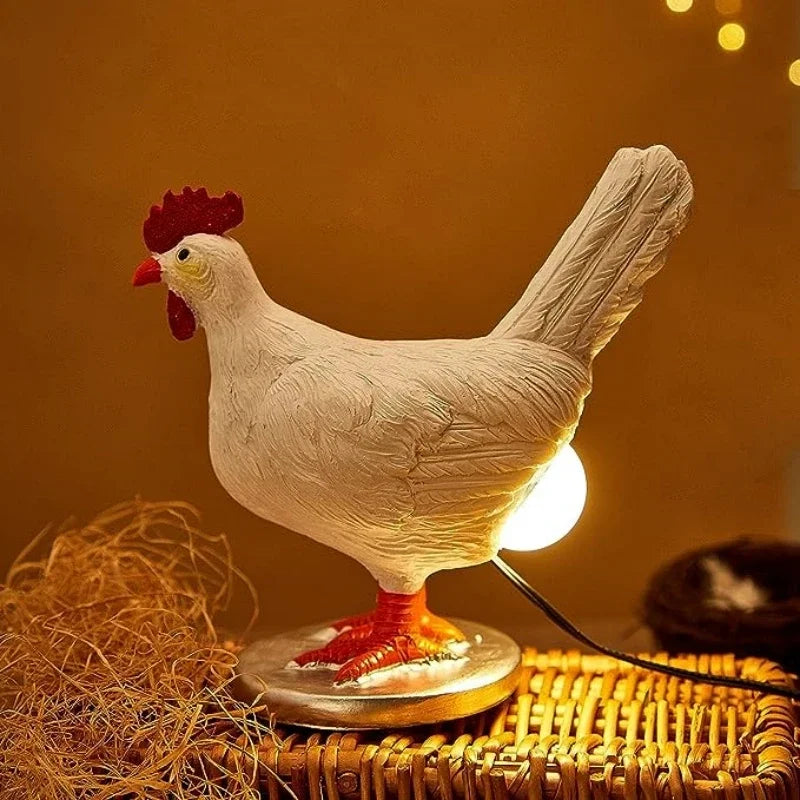 lampe décorative moderne poule blanc rouge détails sculptés chambre coucher