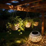 lampe solaire moderne perforations dorées jardin patio extérieur noir éclairage paysager