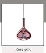 lampe suspendue moderne rose transparent fumé gris goutte forme allongée industriel fil apparent métal