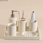 ensemble salle bain moderne brosse dents pot dentifrice distributeur savon blanc crème grain ciment