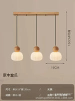 suspension lumineuse trois abatjour bois foncé blanc laiteux moderne minimaliste
