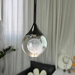 suspension lumineuse moderne noir argenté transparent serviettes peignoirs osier decoration interieur minimaliste