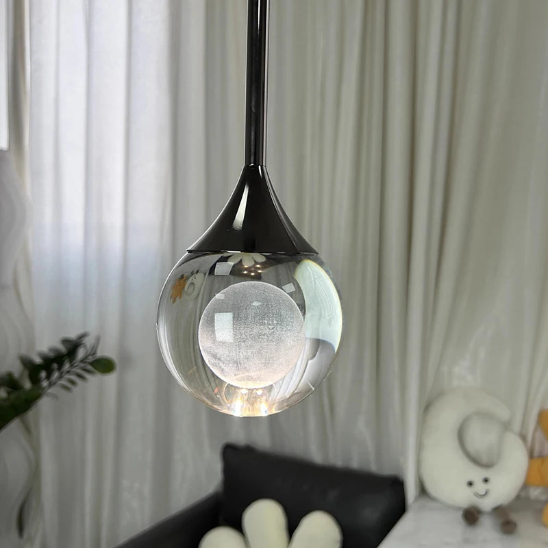 suspension lumineuse moderne noir argenté transparent serviettes peignoirs osier decoration interieur minimaliste