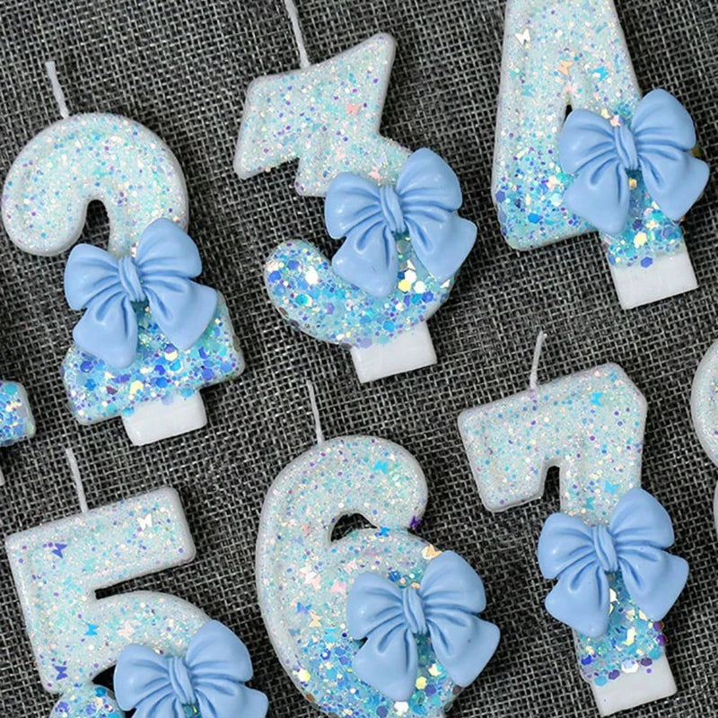 bougies anniversaire chiffres paillettes bleues rubans décoratives festives numérotées blanc