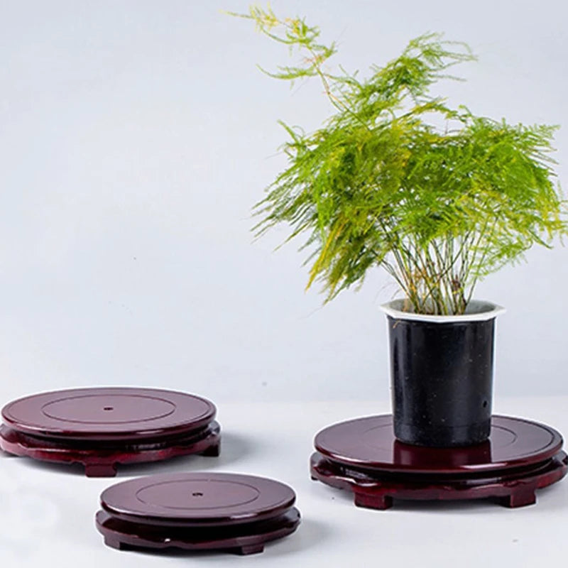 supports ronds exposition objets rouge foncé marron brillant pieds sculptés traditionnel inspiration asiatique ensemble