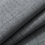 Image d'un tissu gris élégant, idéal pour la décoration intérieure. Texture douce au toucher, parfait pour des projets d'ameublement et de mode. Sélection de qualité pour un style moderne et sophistiqué.