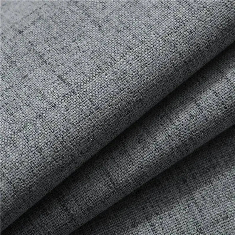 Image d'un tissu gris élégant, idéal pour la décoration intérieure. Texture douce au toucher, parfait pour des projets d'ameublement et de mode. Sélection de qualité pour un style moderne et sophistiqué.
