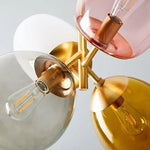 Suspension lumineuse moderne blanc rose doré rond translucide ampoules filament