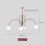 lustre moderne rouge noir doré sphères blanches opaques suspension salon chambre