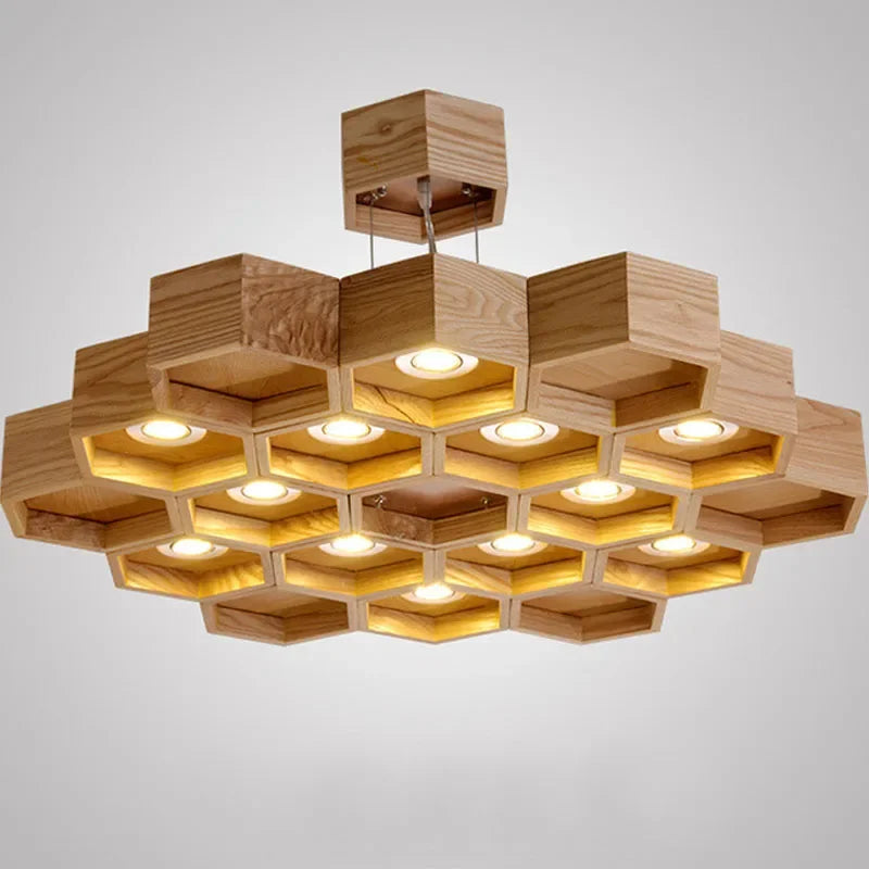 lumière suspendue bois clair nid d'abeille hexagonal modernes led câbles argentés structure géométrique