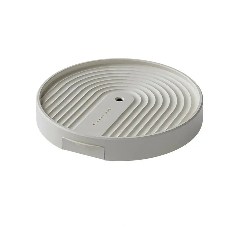 support plante roulettes collecte eau moderne gris clair rayures concentriquesversibleintérieur