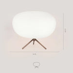 lampe table moderne verre blanc motif rayures horizontales pied bois salon intérieur