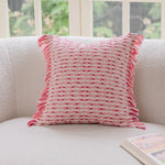 coussin deco boho chic rose blanc motif geometrique franges opaques canape lit decoration intérieure