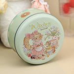 boîte ronde métal blanc rose vert bleu dessin animé wishes fruits gâteaux animaux festive