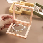 présentoir bijoux blanc doré métal classique bracelets boucles oreilles opaques adhésif
