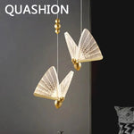 lampe suspendue moderne or blanc papillon filigrane chambre salon