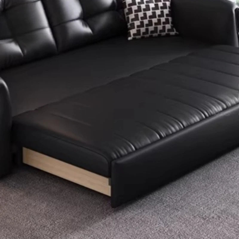canapé lit noir simili cuir moderne coussin décoratif table basse tapis couverture