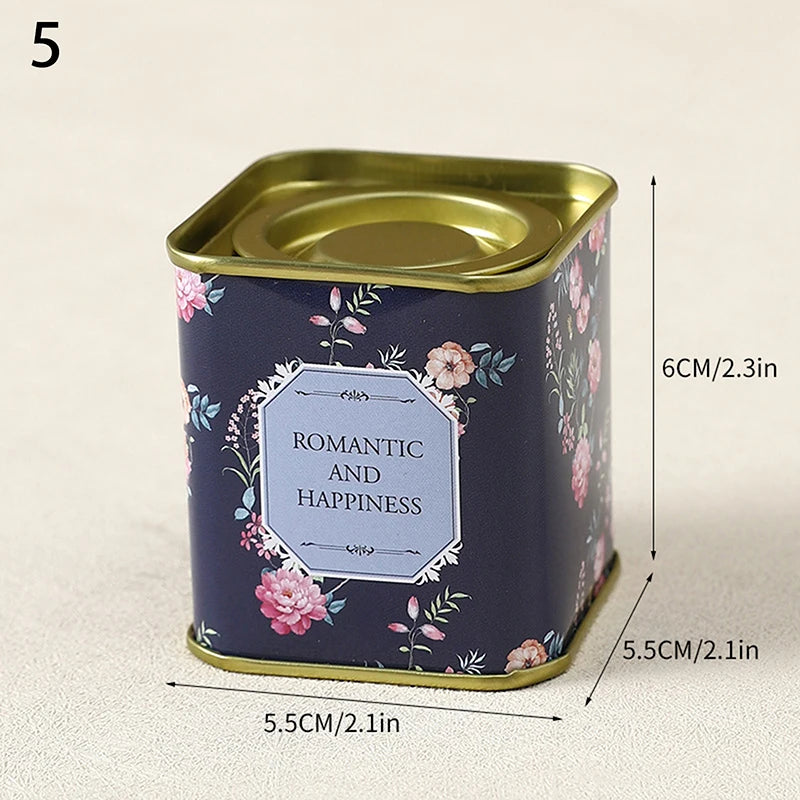 boîtes métal bleu rose noir fleurs vintage capsules étiquettes messages conservation snacks thé
