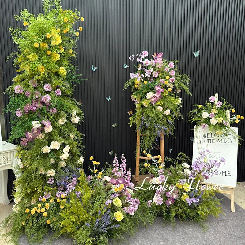 décoration murale naturelle composition florale variée couleurs vives rustique bienvenue mariage