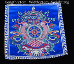 serviettes traditionnelles multicolores brodées motifs floraux géométriques opaques