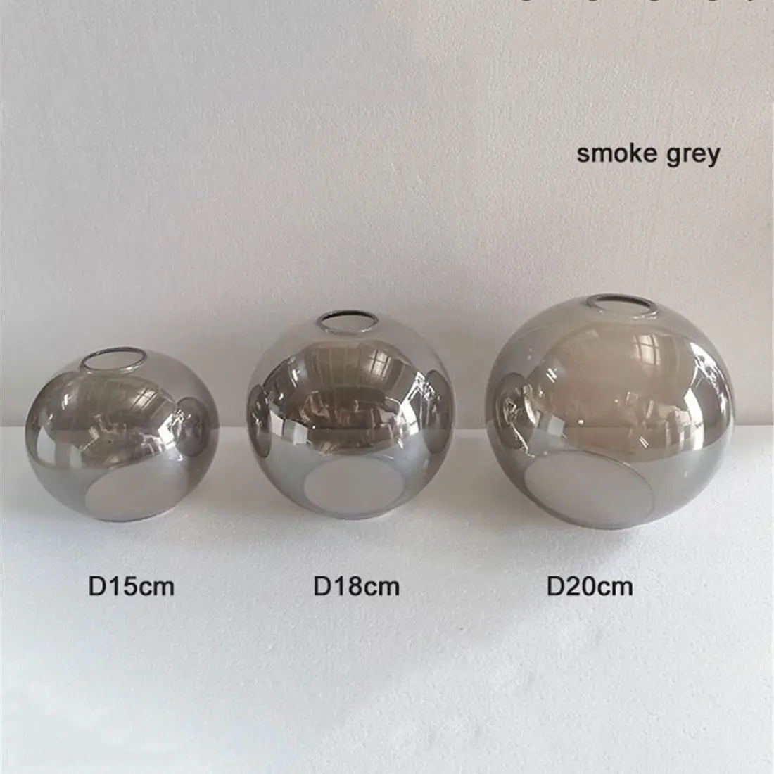 suspension boule verre moderne transparent ambre gris cognac diverse tailles