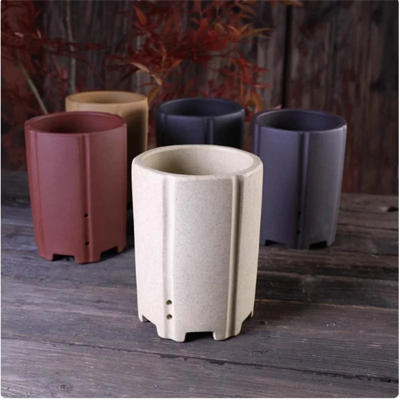 Cache pot céramique moderne rouge beige noir texture granulée fleur plante verteintérieur decoration