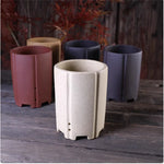 Cache pot céramique moderne rouge beige noir texture granulée fleur plante verteintérieur decoration