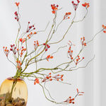 décoration intérieure branche artificielle feuilles automne baies rouges vert ornement hiver naturel rustic maison