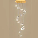 suspension lumineuse moderne transparente dorée facettes géométriques élégantes multiples lampes