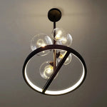 suspension lumineuse moderne sphères verre transparent anneaux métalliques noir doré grisclair