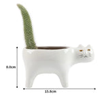 cache pot céramique chat stylisé moderne vert foncé glacé table jardin salon