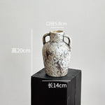vase poterie moderne gris beige fleur séchée décoration intérieure texture marbrée lisse rustique arrangement