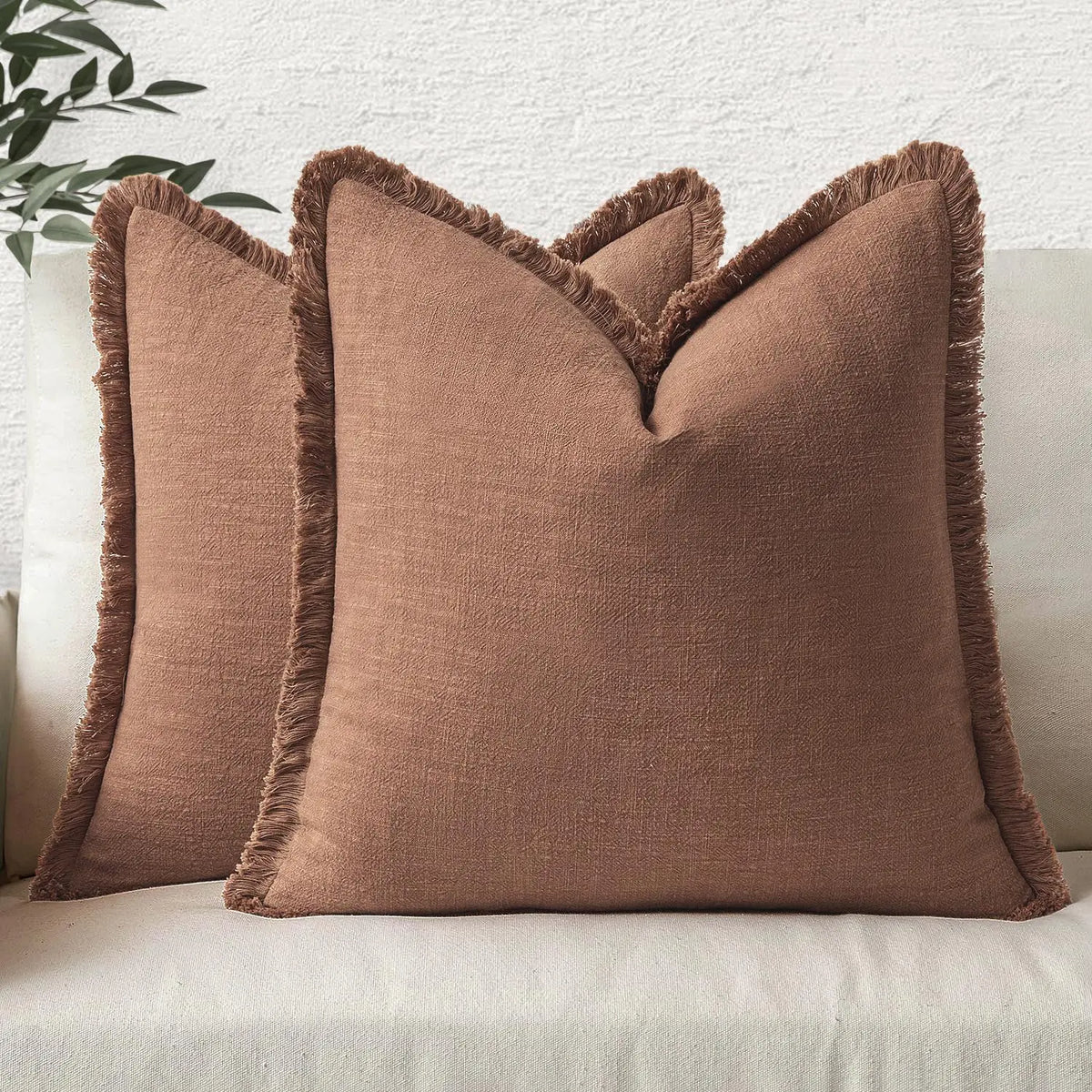 housses coussins lin beige rustique franges pompons salon maison farmhouse écologiques simples hospitalières