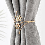 anneaux fenêtre or argent fleurs stylisées modernes élégants anneaux métalliques fixations brillantes contemporain