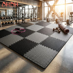tapis sol modulable caoutchouc gris noir blanc carreaux géométriques antidérapant exercices maison