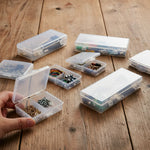 boîtes rangement transparentes clips bijoux multicolores pièces métalliques modernes respectueux environnement