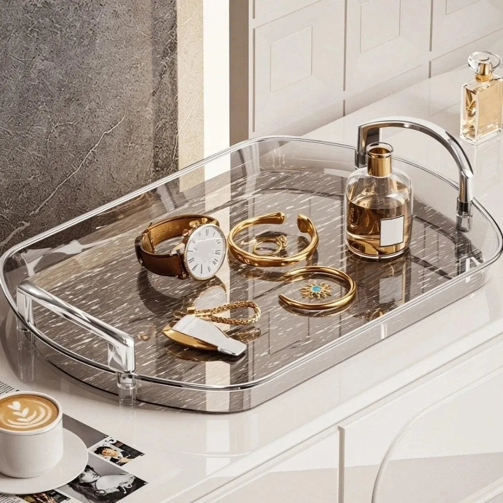 plateau rectangulaire moderne élégant poignées métalliques transparent doré texture marbrée bijoux parfums tasses