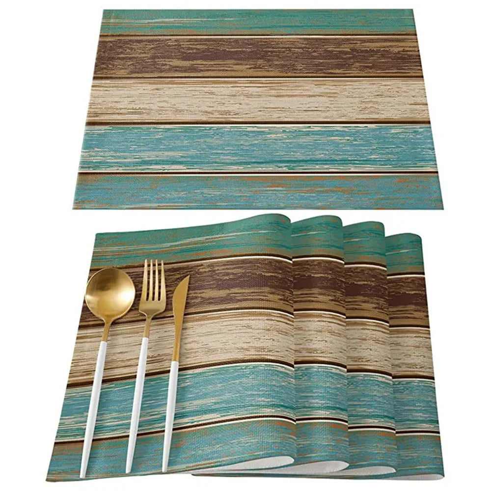 tapis table moderne rustique bleu brun beige rayures horizontales assiettes cuillères fourchettes couteaux verres