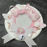 couronne baptême ailes rubans pompons croix dentelle blanche rose violet bleu jaune