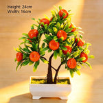 décoration intérieure arbre artificiel bonsaï pot blanc feuilles vertes fruits rouges tronc brun