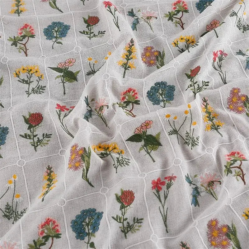 tissu dentelle brodé fleurs colorées polyester coton respectueux environnement largeur 125cm blanc jaune rose