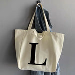 sac main femme toile beige clair lettre noire poignées détachables