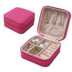 boîte bijoux simili cuir vert pastel moderne fermeture glissière blanc rose pâle boucles doreilles