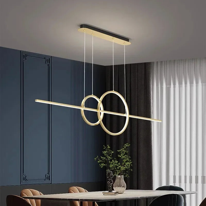 suspension lumineuse moderne or noir minimaliste câbles suspendus panneaux texturés