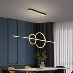 suspension lumineuse moderne or noir minimaliste câbles suspendus panneaux texturés