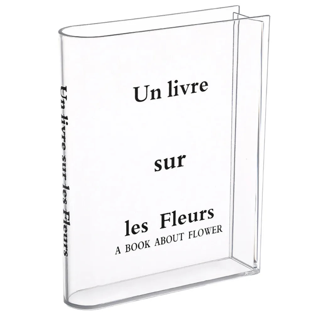 vase transparent moderne texte livre fleurs variées décoration intérieure minimaliste