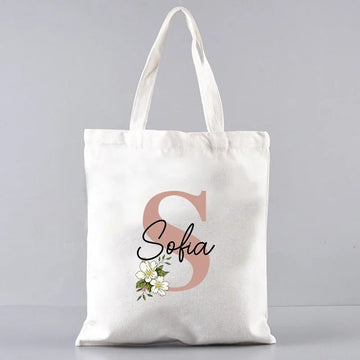 sac main femme toile blanche motif fleurs lettres grandes poignées réutilisable moderne
