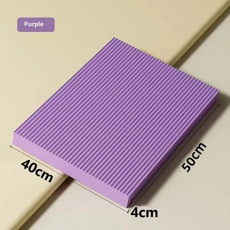 tapis d'équilibre antidérapant mousse haute résilience violet noir yoga abdos genoux moderne minimaliste